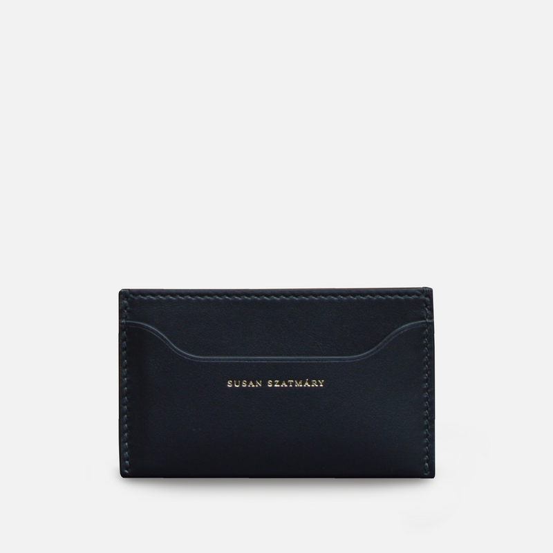Slim Susan Szatmáry black leather card holder featuring two credit card slots and a central compartment. Minimalist luxury wallet for everyday use.