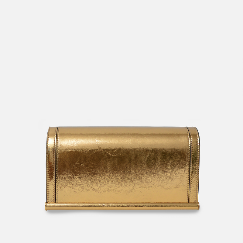 This sculptural gold leather clutch is a modern tribute to history and form, combining Scandinavian design with precise Italian craftsmanship.
